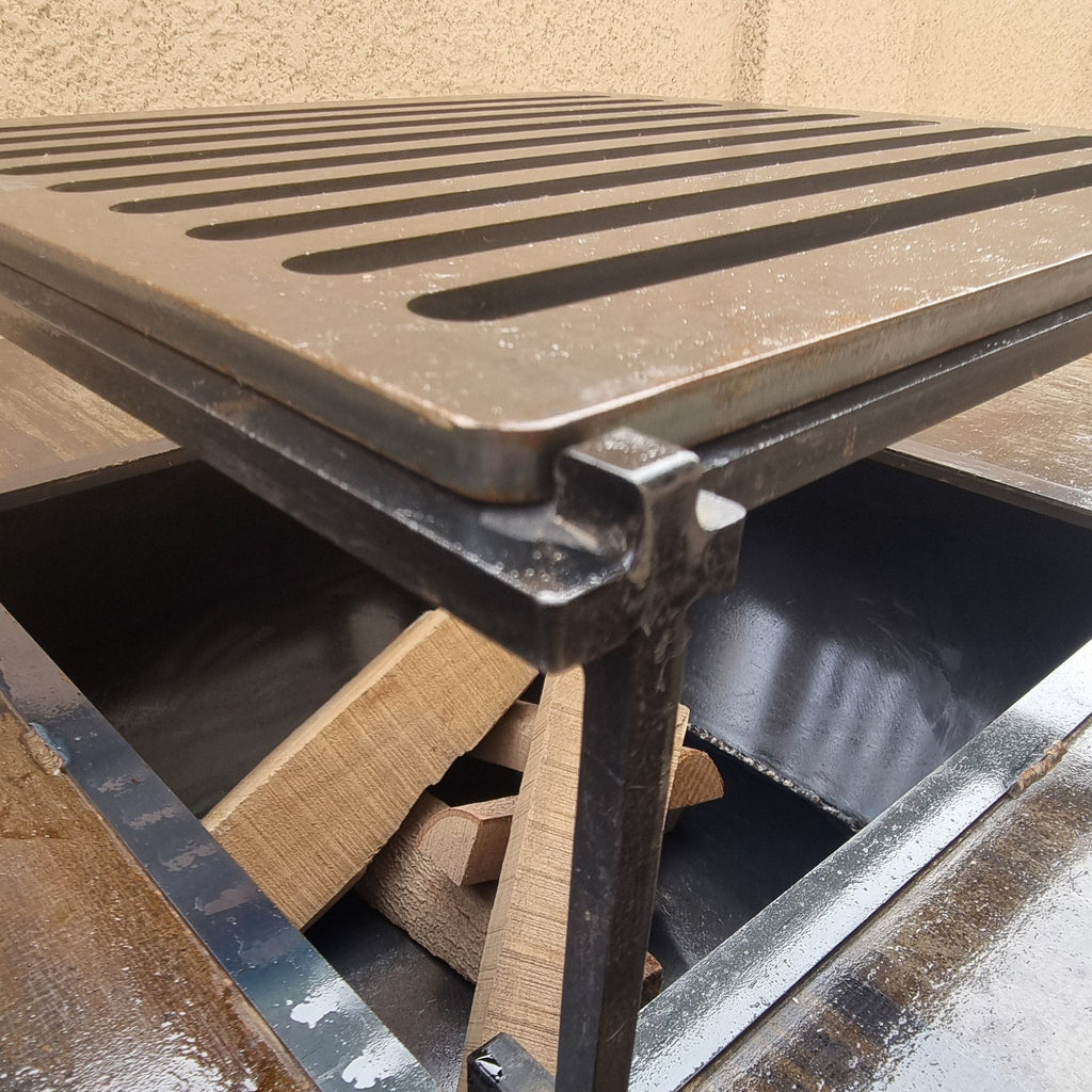 The Square Pit grill in use